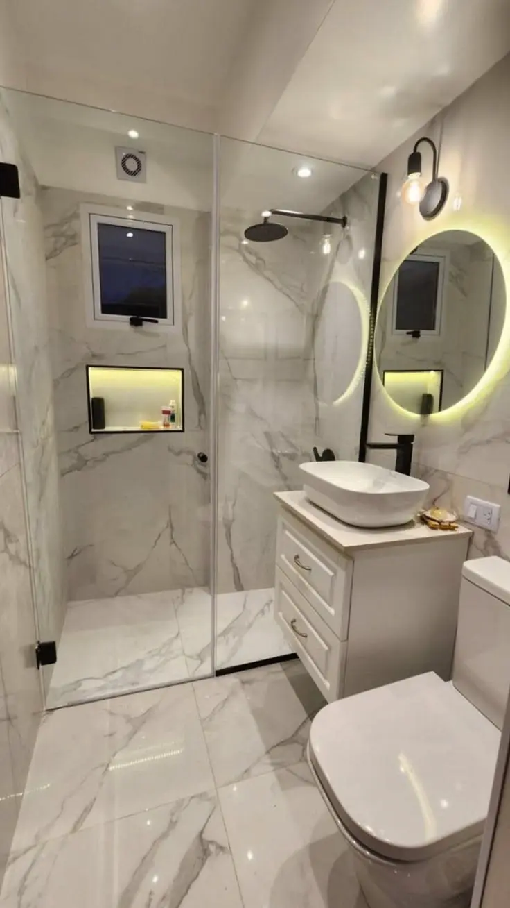 Remodeled bathroom with walk-in shower in New York